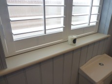 Bathroom shutters close view